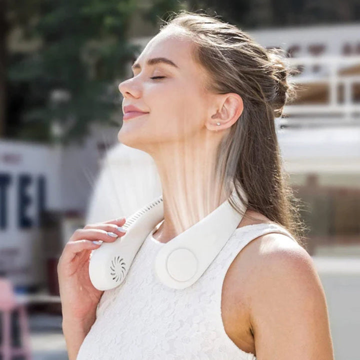 Lightweight, ergonomic neck fan provides bladeless cooling. Your ultimate portable summer essential.