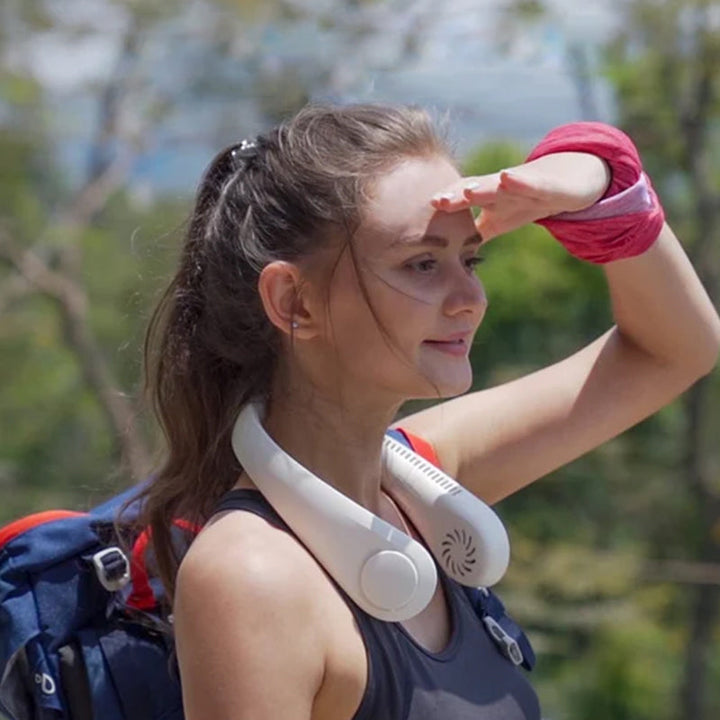 Stay cool with the unisex portable neck fan. Ideal for travel, work, or any outdoor adventure.