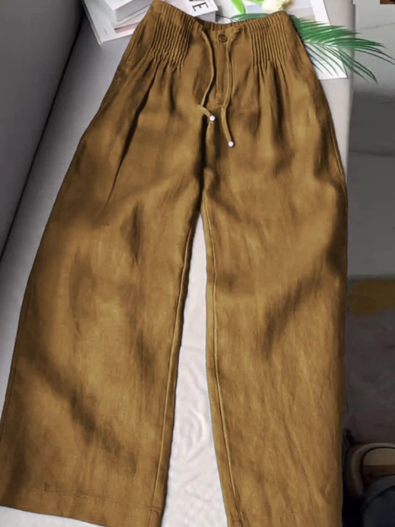 Relaxed fit women's wide leg pants with adjustable drawstring, ideal for ultimate comfort.