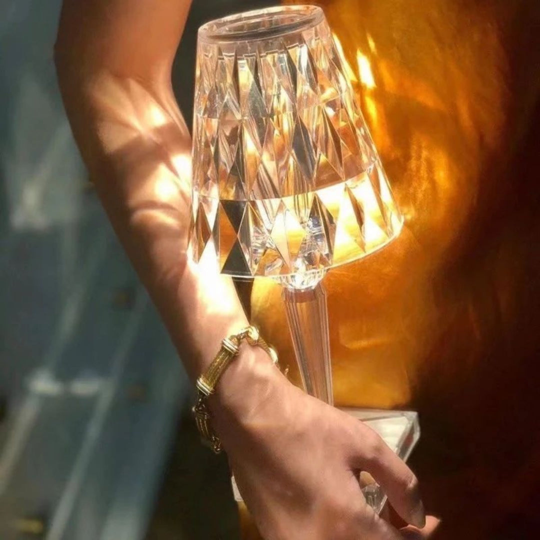 Elegant crystal table lamp with touch dimming, rechargeable LED for modern interiors.
