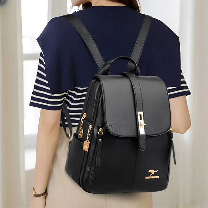 Elegant women's leather backpack, perfect for daily carry & fashion. Stylish design with functional compartments.