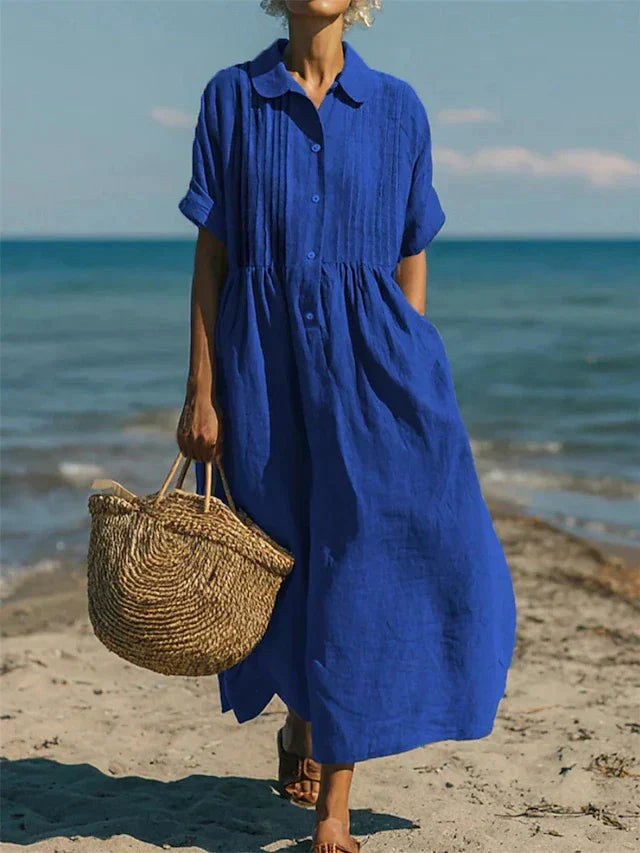 Relaxed fit women's collared button-down midi dress for effortless casual summer fashion.
