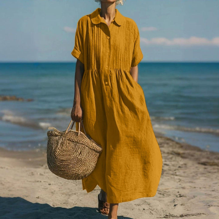 Effortless women's collared midi shirt dress with button front, a versatile casual summer staple.