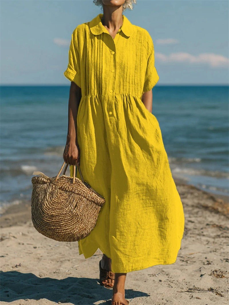 Comfortable women's relaxed fit collared midi shirt dress with button-front closure.