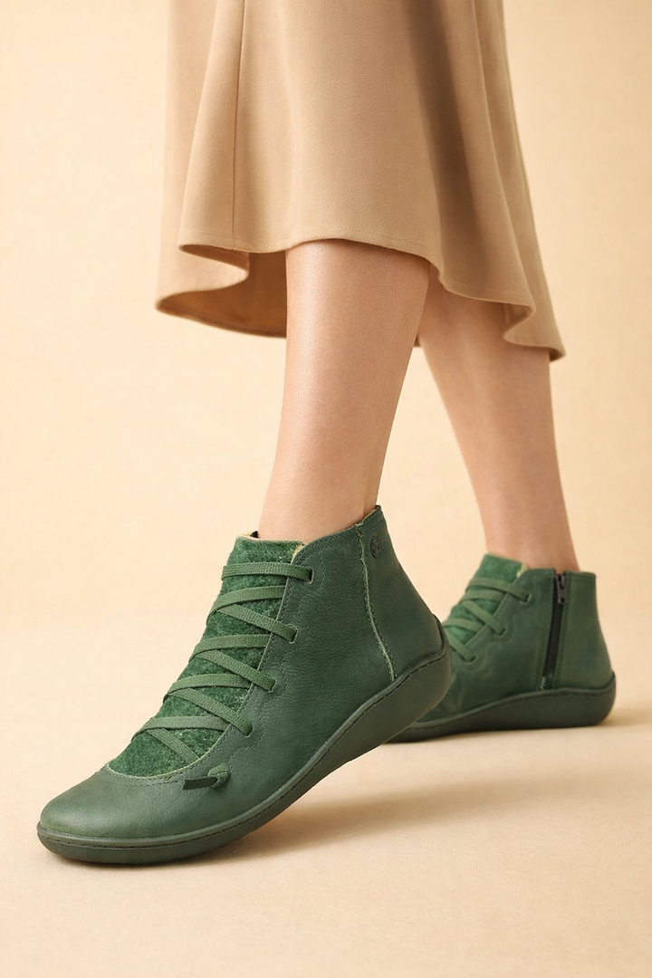 Woman wearing stylish Nina supportive ankle boots for all-day comfort