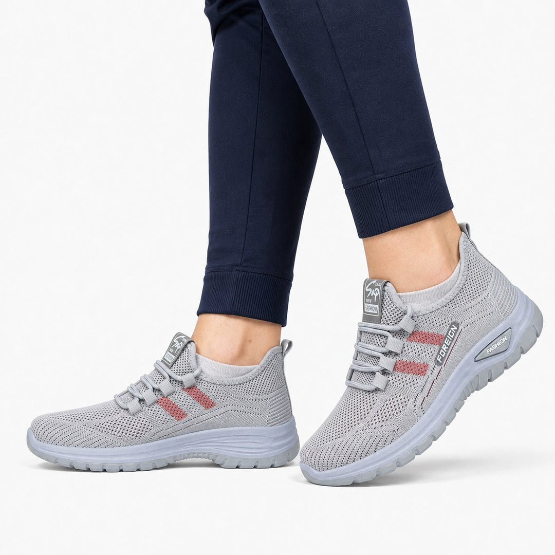 Women's light walking shoes with anti-slip sole for daily comfort and stability.