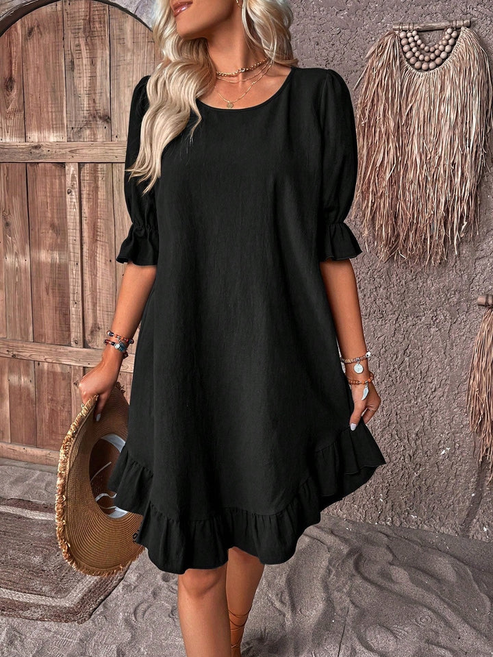 Versatile women's relaxed summer dress with ruffles, great for comfortable casual wear & holiday elegance.