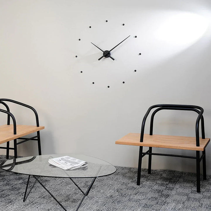Elegant modern wall clock, minimalist design, perfect for stylish living room or office decor. Contemporary silent quartz clock.