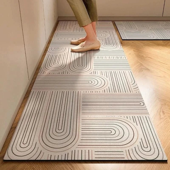 Stylish grey anti-fatigue kitchen rug, non-slip design for comfort & modern kitchen decor.
