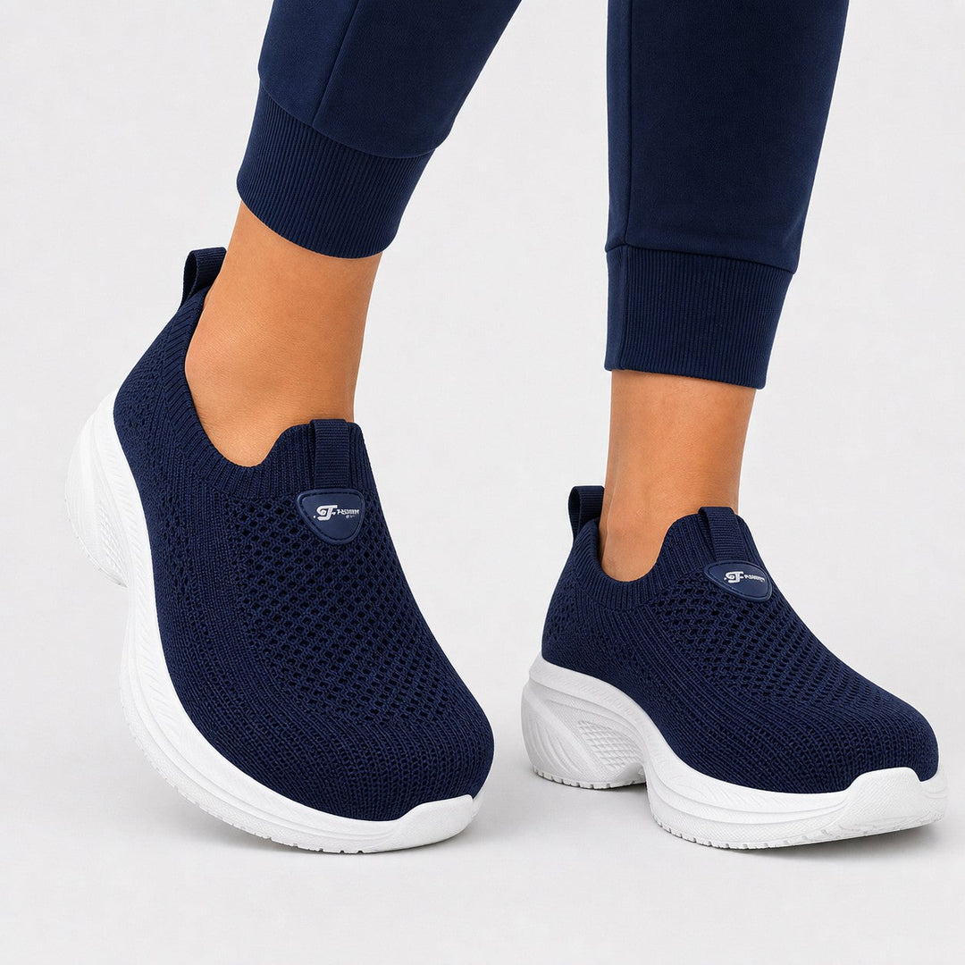 Sleek navy women's wide toe comfort slip-on shoes, designed for supportive walking.