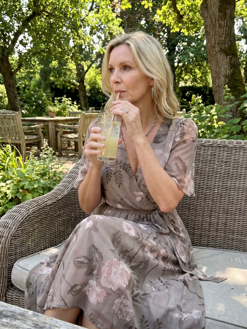 Floral print wrap midi dress, women's elegant style, flutter sleeves, asymmetric hem, event.