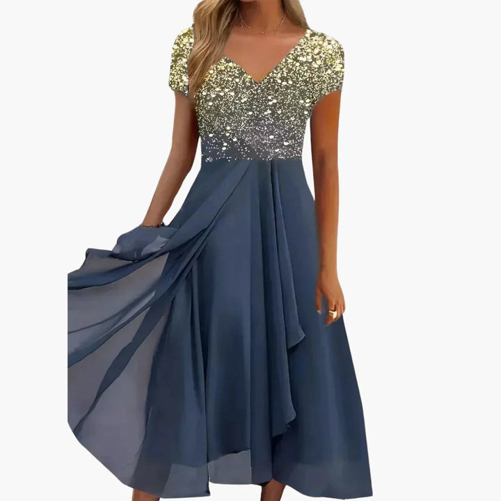 Women's sophisticated sequin floral midi cocktail dress, an elegant evening gown with a draped skirt.