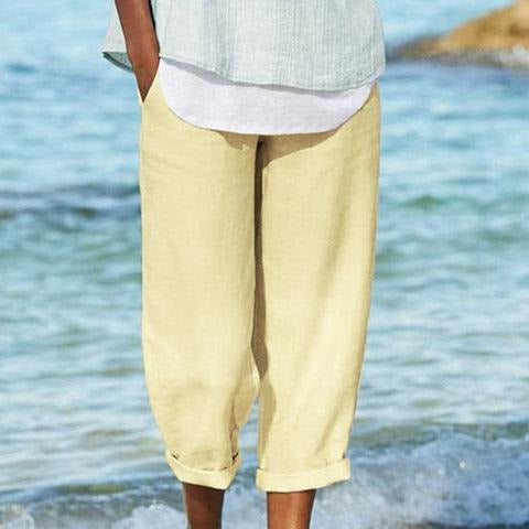 Trendy women's casual cropped wide-leg pants offering a comfortable, relaxed fit for stylish summer outfits. Versatile design.