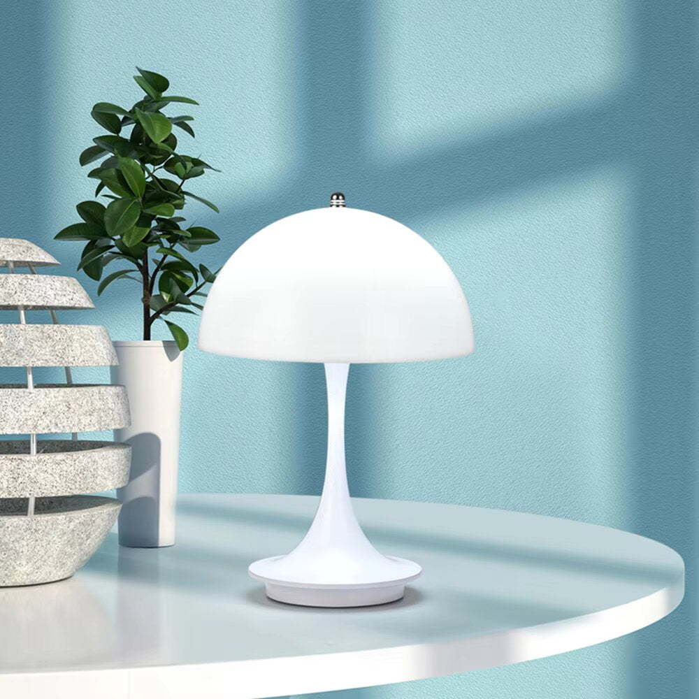 Modern cordless LED table lamp, portable & dimmable design for home decor.