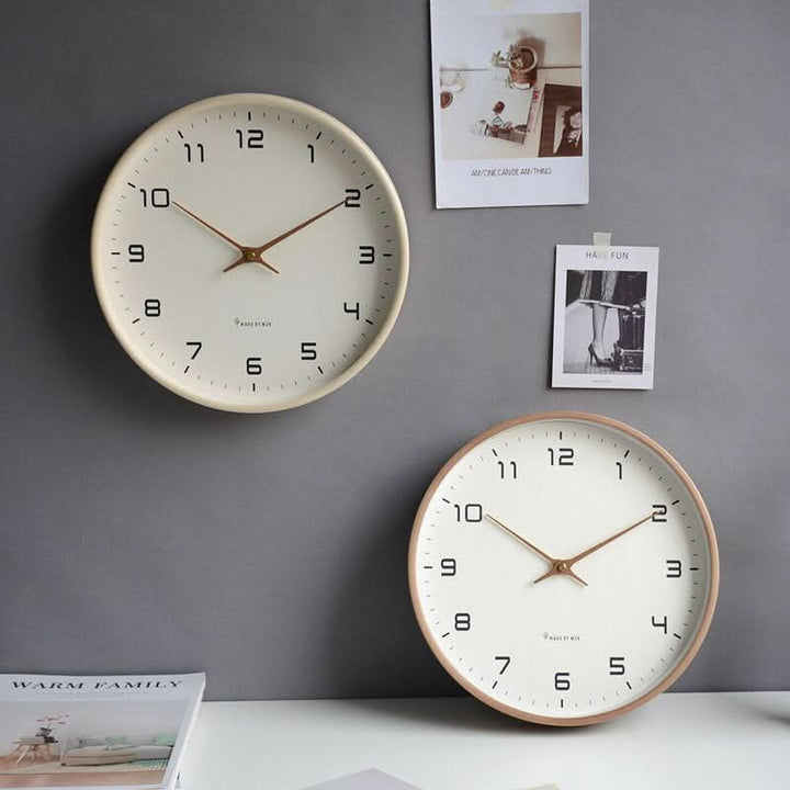 Modern wooden silent wall clock, a stylish piece of wall decor for contemporary or Scandinavian interiors.
