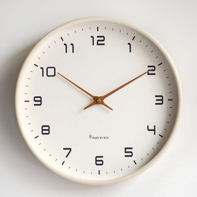 Elegant silent wooden wall clock featuring natural wood and a sleek design for home or office.