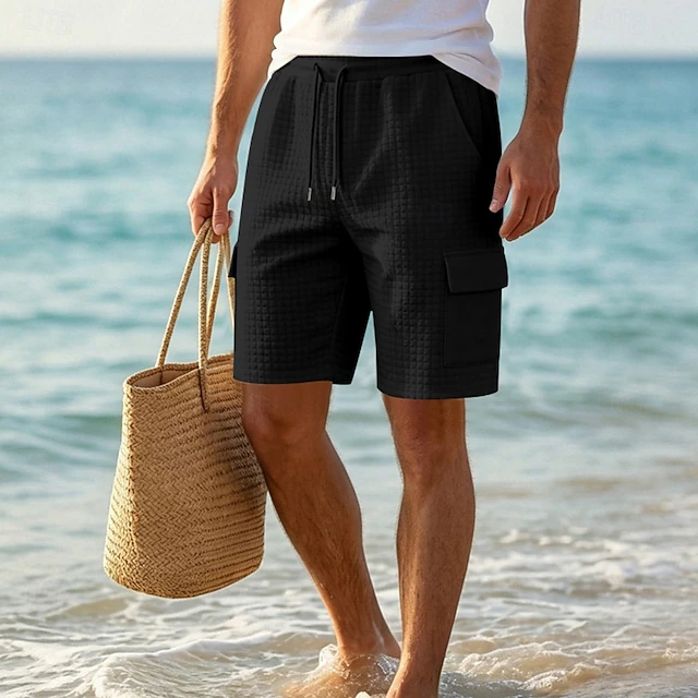 Utility-focused men's cargo shorts with a comfortable relaxed fit and adjustable drawstring for daily wear.