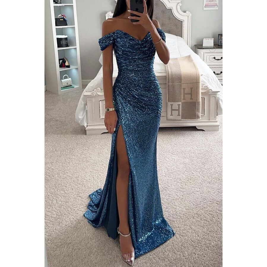 Red carpet ready women's sequin off-shoulder dress featuring a bold thigh slit and maxi length. [[lstfy-media:6]]