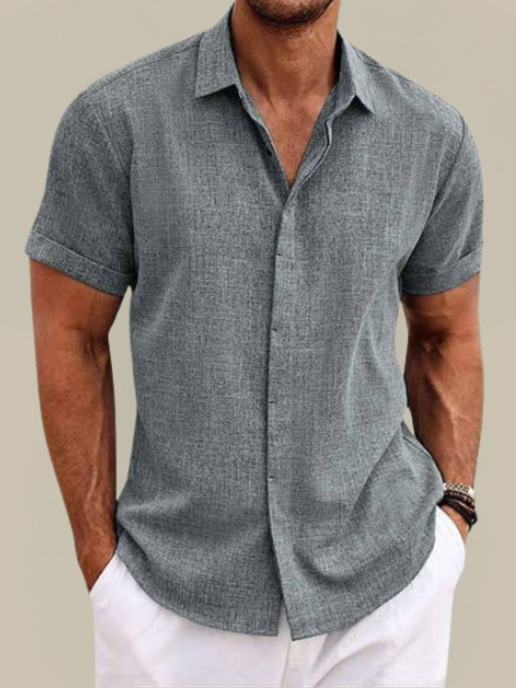Versatile men's short sleeve button-up shirt, a sophisticated smart casual choice for summer style & everyday fashion.