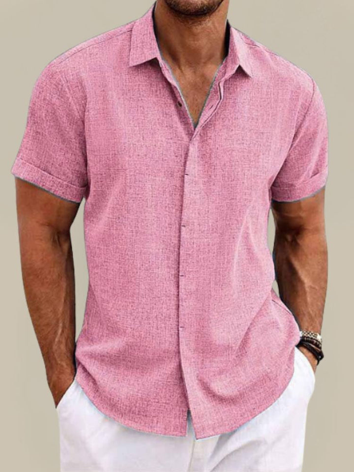 Sophisticated men's short sleeve button-up shirt, offering a relaxed fit for smart casual and warm weather style.