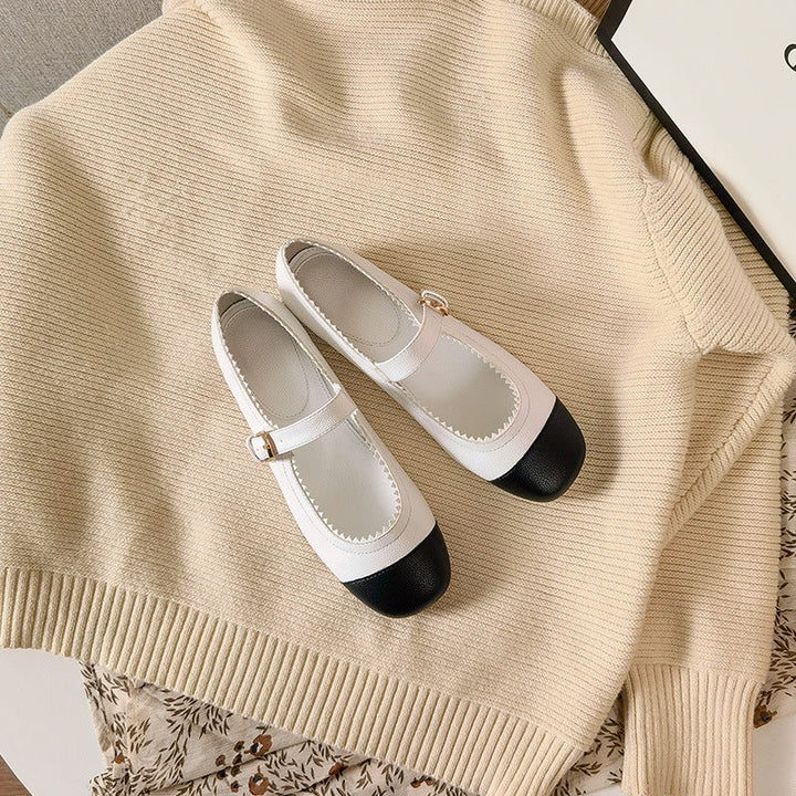 Stylish two-tone Mary Jane platform heels, a chic choice for elegant women's footwear.