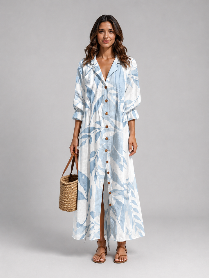 Women's refined printed maxi dress with pintuck bodice, V-neck, and flowy silhouette, perfect for summer.