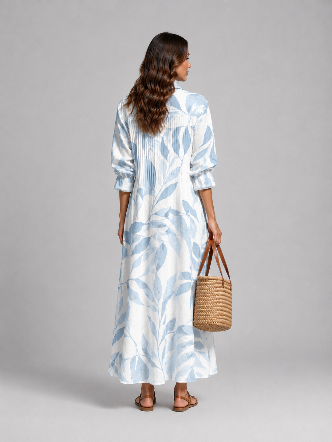 Elegant printed maxi dress with pintuck bodice, perfect for vacation, resort wear, or a chic summer party.