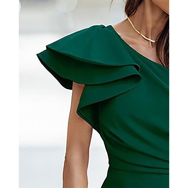 Asymmetric one-shoulder women's midi dress. Elegant and comfortable, ideal for stylish evening or casual occasions.