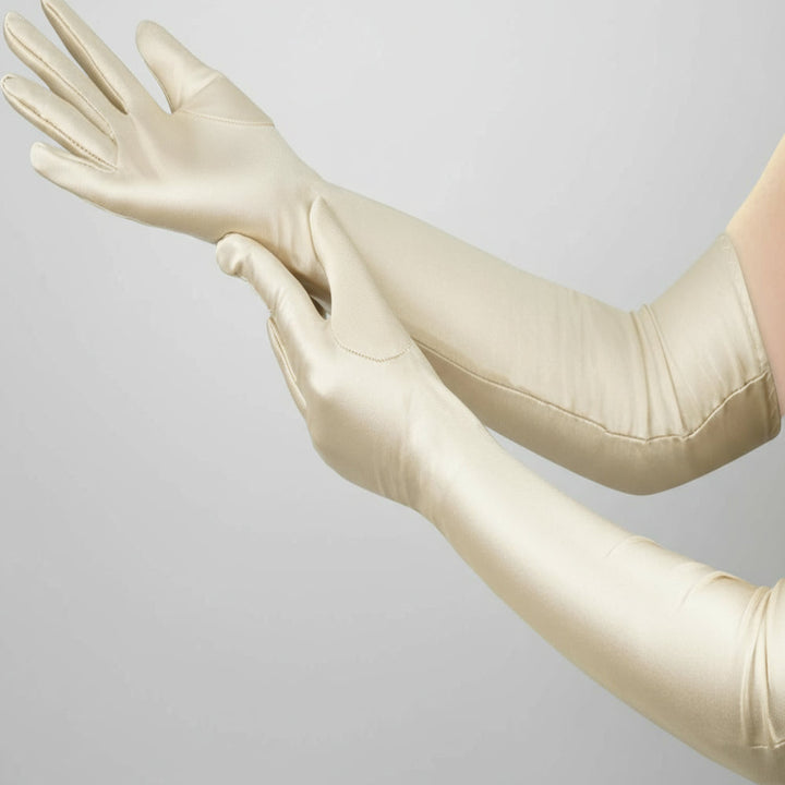 Sleek elbow length evening gloves, a chic accessory for upscale events & costume parties.