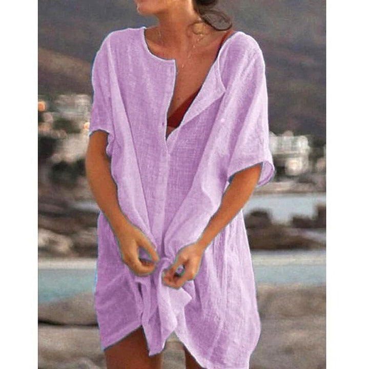 Lightweight women's midi beach dress, a chic and casual swim cover-up for sunny beach days and summer style.