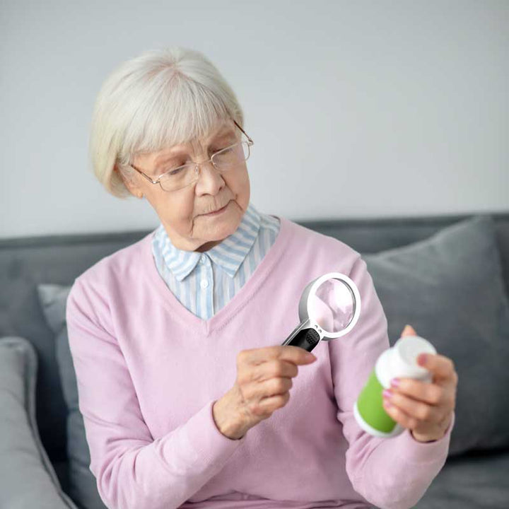 High-quality LED magnifier with a clear lens for precise reading, a vital low vision tool.