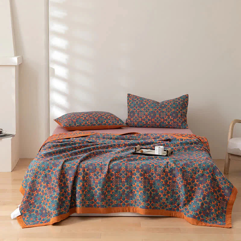 Premium six-layer cotton quilt with an attractive orange & blue pattern, perfect for modern bedroom bedding.