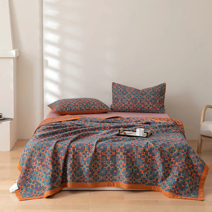 Premium six-layer cotton quilt with an attractive orange & blue pattern, perfect for modern bedroom bedding.