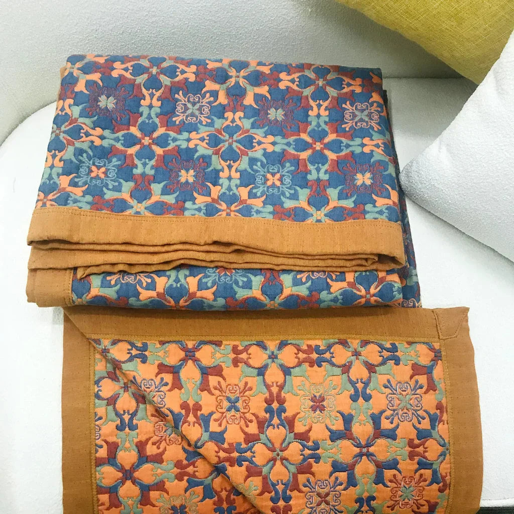 Cozy Home orange & blue patterned cotton quilt, a comfortable six-layer design for stylish bedroom decor.