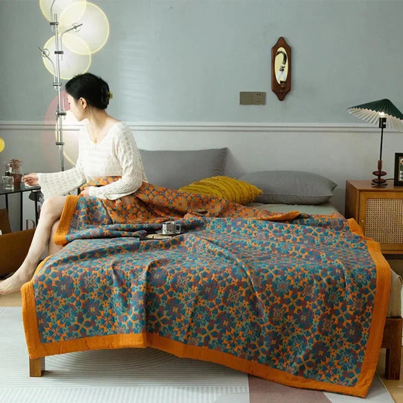 Cozy Home six-layer cotton quilt with vibrant orange & blue pattern, ideal for comfortable bedroom bedding.