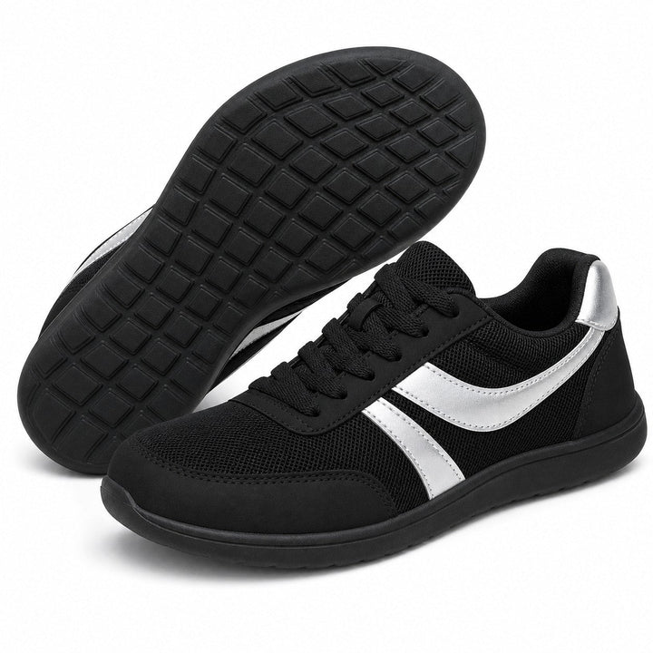Lightweight women's walking shoes, engineered for roomy toe comfort and support.