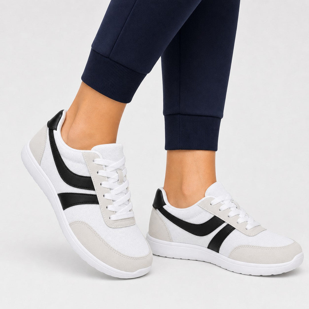 Casual women's walking shoes with a roomy toe design, ideal for long walks.
