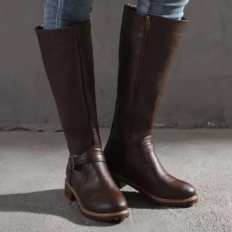 Stylish women's mid-calf orthopedic buckle boots with arch support and side zipper for comfortable winter fashion.