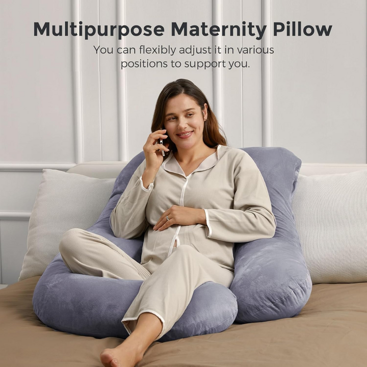 Prenatal full-body orthopedic pillow providing comprehensive maternity support for comfortable sleep.