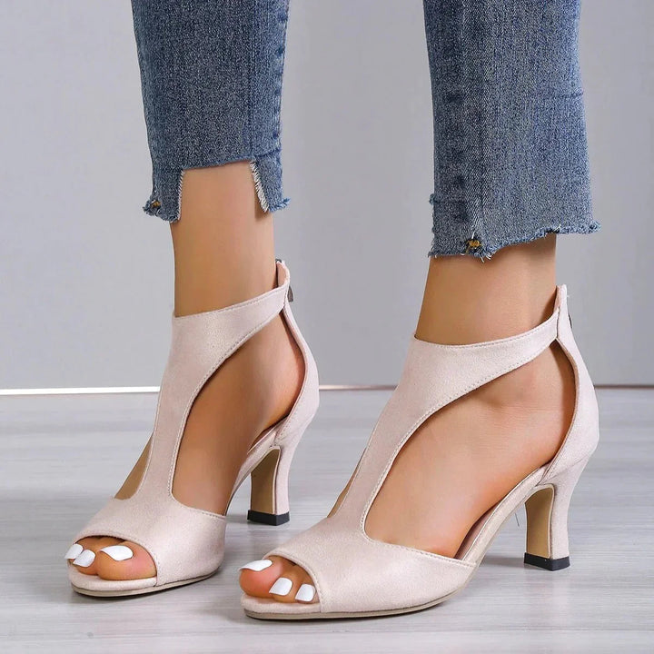 Ladies' comfortable open toe T-strap heels featuring a sturdy block heel and orthopedic support.