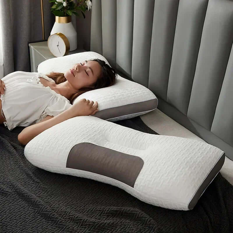 Unisex orthopedic neck support pillow for restful sleep, providing ergonomic comfort & pain relief.