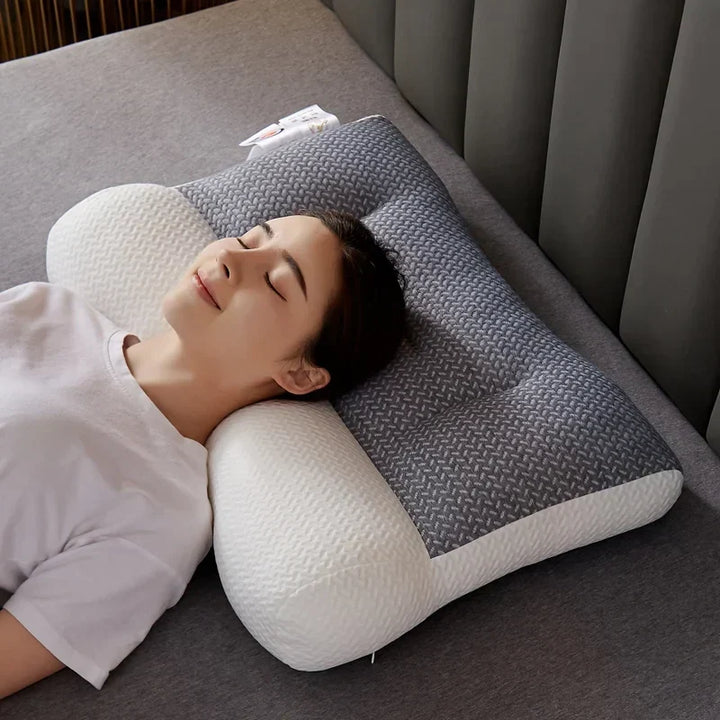 Orthopedic neck pillow for side & back sleepers, providing neck & shoulder pain relief & comfortable sleep support.