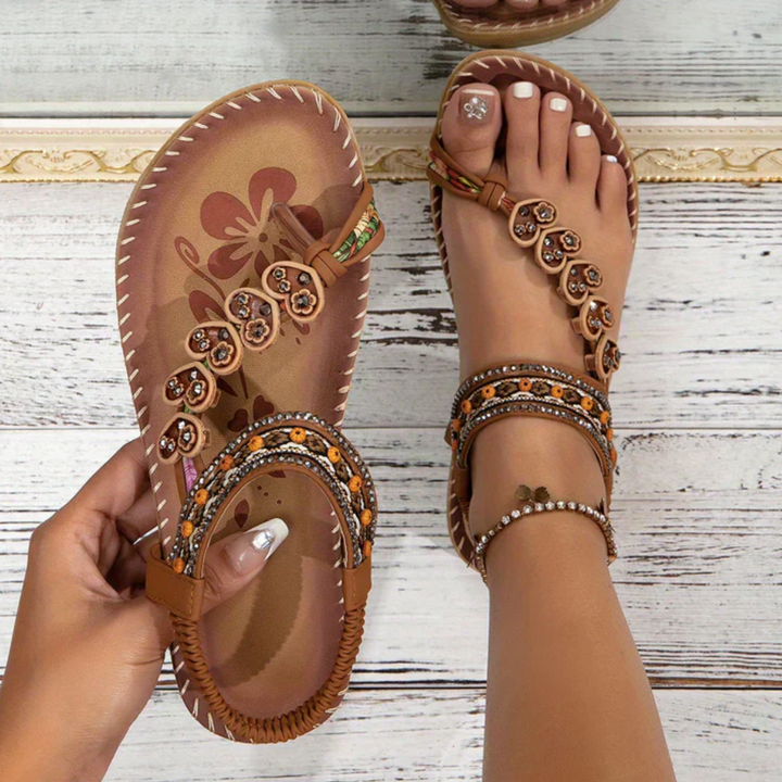 Women's orthopedic T-strap sandals with arch support for comfort. Ideal casual summer footwear.