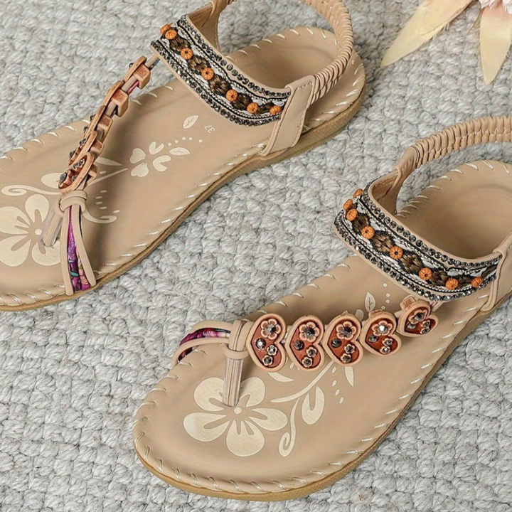 Casual women's T-strap beach sandals, orthopedic comfort with arch support for sunny summer days.