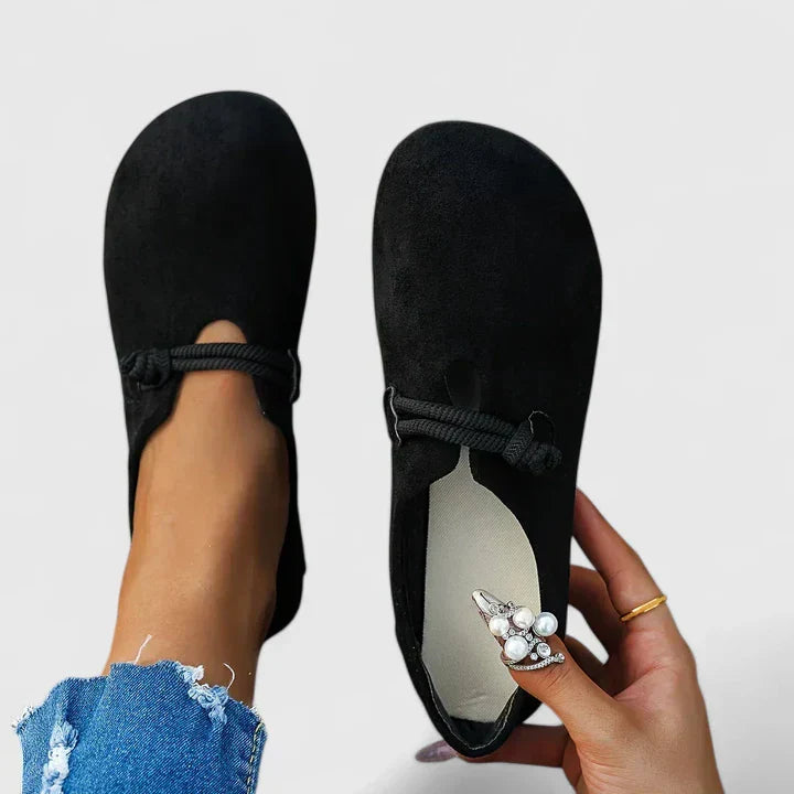 Elegant slip-on women's loafers featuring stylish rope detail and orthopedic comfort for walking.