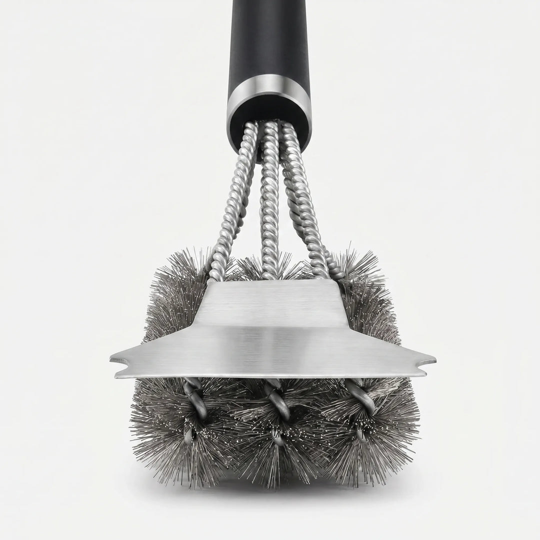 Essential heavy-duty barbecue grill brush & scraper for quick and easy cleaning of outdoor cooking grates.