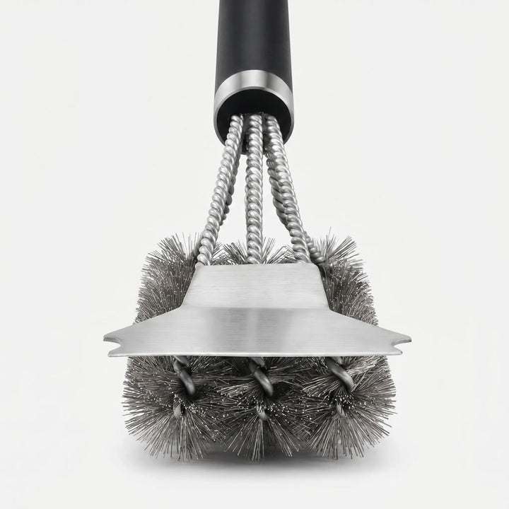 Essential heavy-duty barbecue grill brush & scraper for quick and easy cleaning of outdoor cooking grates.