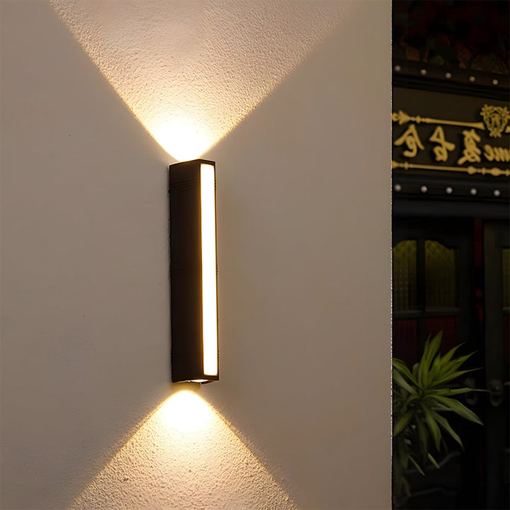 Sleek minimalist black LED outdoor wall light fixture for modern homes.