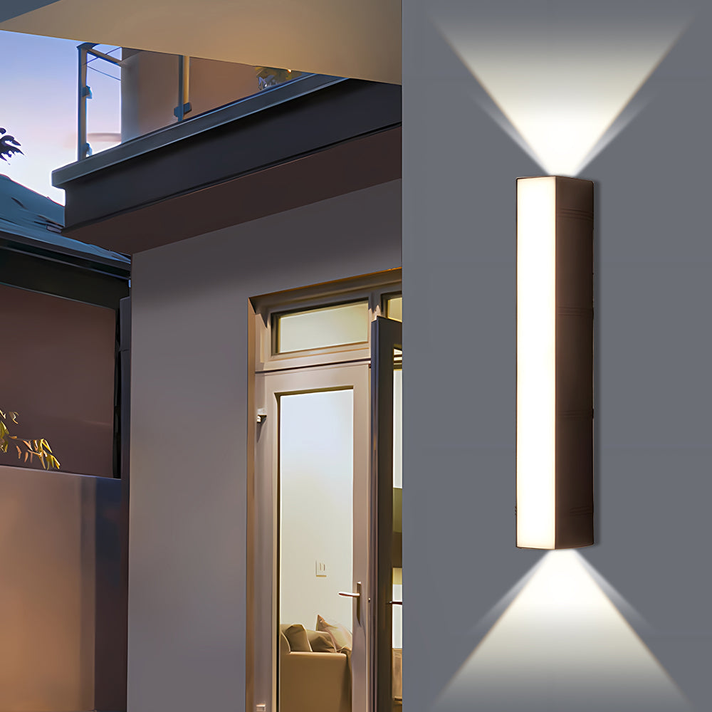 Contemporary minimalist LED outdoor wall sconce with a durable black finish.
