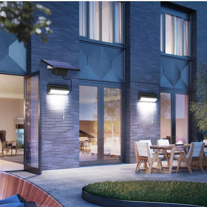 Durable outdoor solar pendant light, sleek black finish, adds stylish ambiance to any yard.